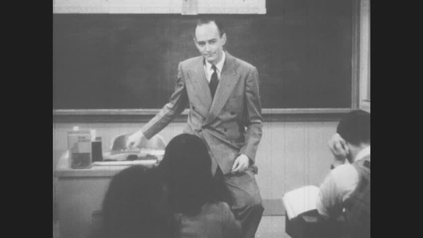 1940s Teacher Stands Arms Crossed Teaches | Editorial Video | 10867355a ...