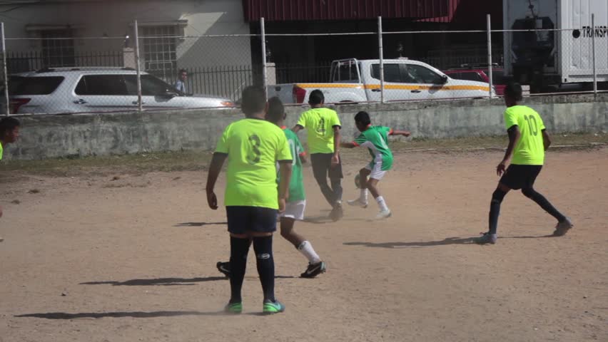 children-playing-soccer-deteriorated-court-latin-editorial-video